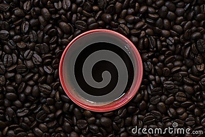 Coffee beans and a coffee cup, hot drink beverage concept Stock Photo