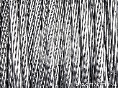 Close up of coiled metal cable industrial background Stock Photo