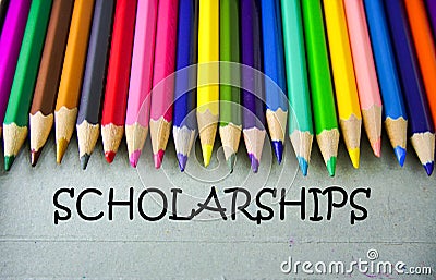 Close up colored pencil writing with SCHOLARSHIPS.Education concept Stock Photo