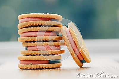 close up on colorful cookies on wooden ledge Stock Photo