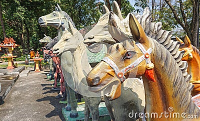 Close up colorful horse statues in park focus on specific brown horse head horse sculpture for background or design illustration Cartoon Illustration