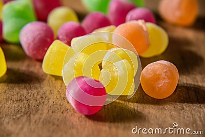 Close up colorful liquor sweets on wooden table Stock Photo