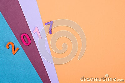 Close up of colorful number 2017 against wooden background. Selective focus. Stock Photo