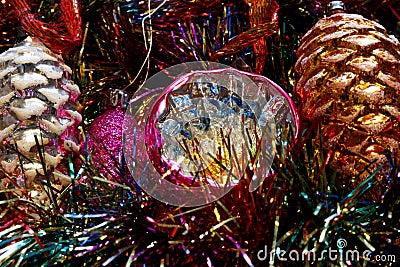 Vintage Christmas tree decorations on a bed of glitter Stock Photo