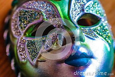 Close up of colourful blue and green glittery masquerade mask Stock Photo
