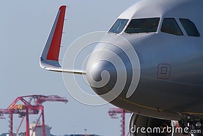 Close up of commercial jet airliner front Stock Photo