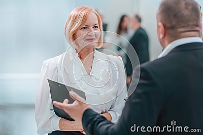 close up . competent businesswoman talking to her colleague. Stock Photo