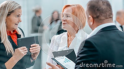 Close up . competent businesswoman talking to her colleague. Stock Photo