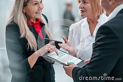 close up . competent businesswoman talking to her colleague. Stock Photo