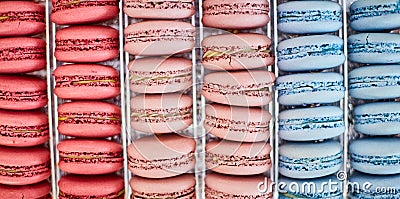 Colorful background of rows of french macaroons. Close up of macaroon cookies Stock Photo