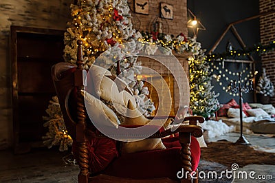 Close up composition of vintage red chair in an christmas studio Stock Photo