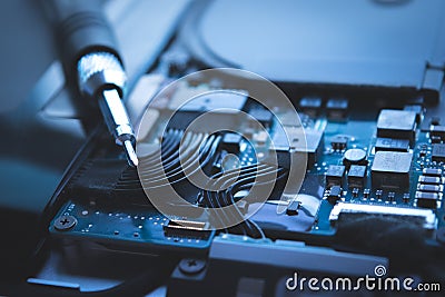 close up computer laptop hard disk drive repair blue background, Apple MacBook Air mainboard. Stock Photo