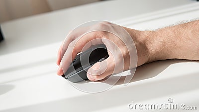 Close-up of a computer mouse on a white background. Input device for computer. Shallow focus Stock Photo