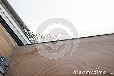 Close up of condensation on velux window in a house, water drops and hight humidity Stock Photo