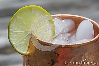 Close up of copper mug with lime Stock Photo