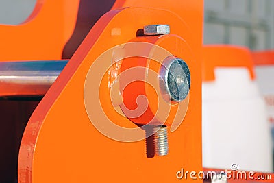 Close-up - Cotter pin bolt of the axle of agricultural seeders Stock Photo