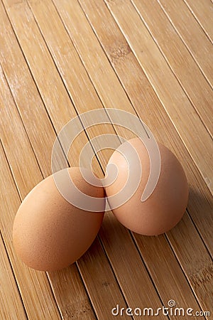 Couple eggs on wooden background Stock Photo