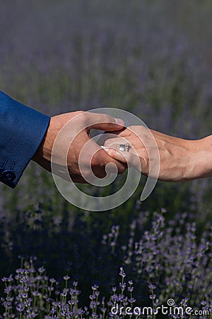 Close up of couple hands with engagement ring Stock Photo