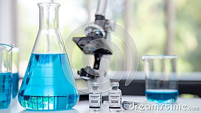 Close-Up on Covid 19 Vaccine on Laboratory Stock Photo