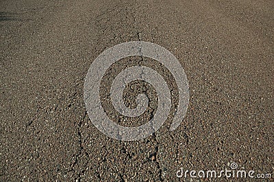 Close-up of cracked asphalt on a road Stock Photo