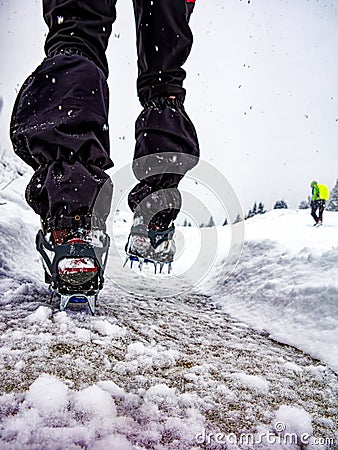 Close-up of crampons in a winter trekking Stock Photo