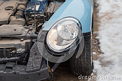 Close up of a crashed car. Auto crash, wreck with damage injury. Street, traffic collision. Broken metal. Automobile Stock Photo