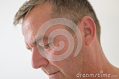 Close up cropped side profile of a middle-aged man Stock Photo