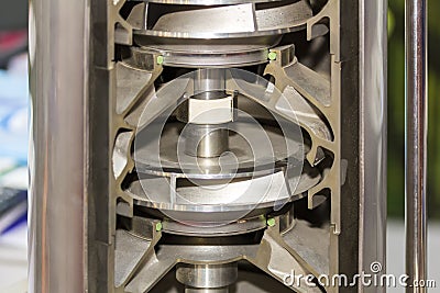 Close up cross section detail impeller and inside centrifugal multistage ring vertical pump for industrial Stock Photo