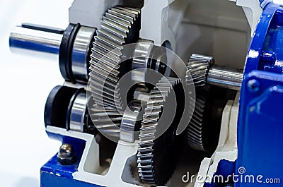 Close-up of cross-section helical gearbox with motor Stock Photo