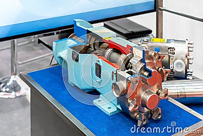 Close up cross section of High technology and quality rotary or lobe gear vacuum pump with gear box for industrial on table Stock Photo