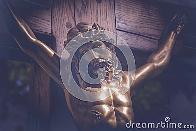 Close up crucifixion of Jesus Christ. Retro styled image Stock Photo