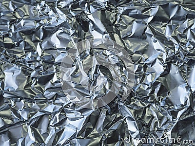 Close up crumpled aluminium tinfoil silver background Stock Photo