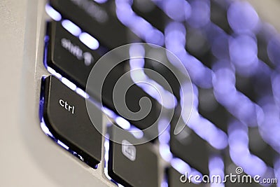 illuminated computer keyboard keys or characters with meaning and layered concepts Stock Photo