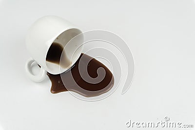 Close up of a cup of coffee spilled Stock Photo