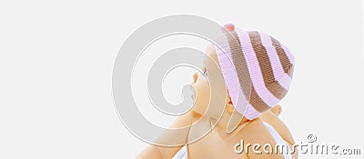 Close up cute baby wearing a hat lying and looking up on a white background Stock Photo