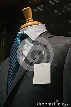 Dark Gray Striped Jacket With A Blank Tag (Vertical) Stock Photo