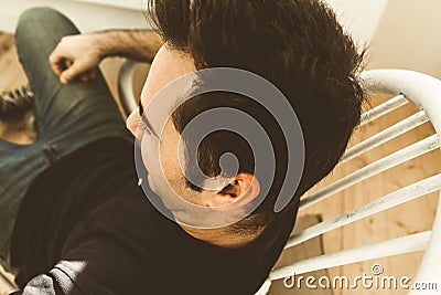 Close-up of a dark young man in profile .Masculinity Stock Photo