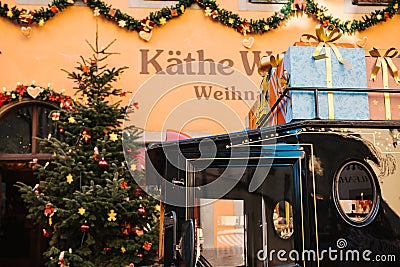 Close-up of a decorated car or bus near a toy store during the Christmas holidays. Editorial Stock Photo