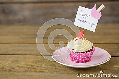 Close-up of delicious cupcake with happy mothers day label Stock Photo