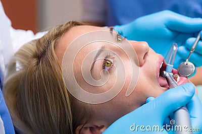 Close-up of dental tools patient open mouth Stock Photo