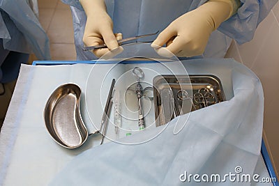 Close-up of dentist`s hands and dental equipment Stock Photo