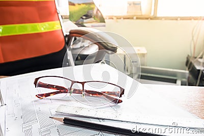 Close up desk of engineer with diagram for fiber optic Stock Photo