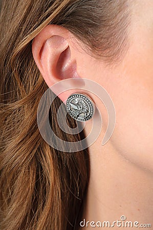 Close up Detail of a earing on a Female Model Stock Photo