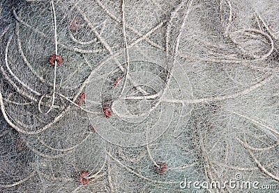 A close up detail of fishing nets, orange floats and rope Stock Photo