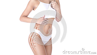 Close up detail of slim attractive female torso in white underwear. Conceptual dotted surgical incision lines marked on Stock Photo