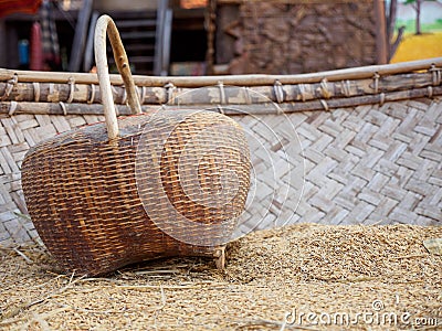 Wooden basket on rice hulls Stock Photo