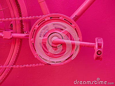 Close up details of a bicycle painted in pink color. Stock Photo