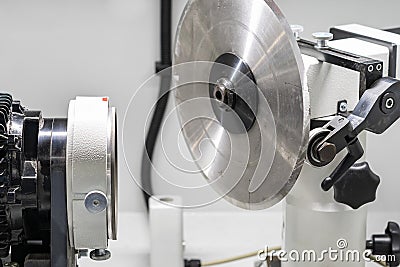 Close up Diamond and pcbn wheel tools mounting on electric motor with metal circle blade in high precision and accuracy tool Stock Photo