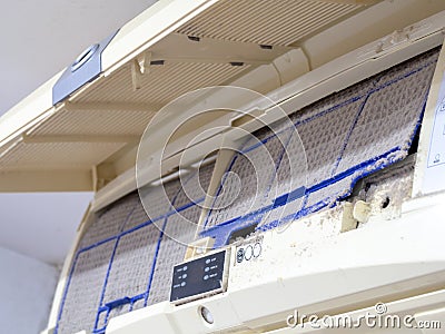Close up dirt air conditioner filter. Danger and the cause of pneumonia and respiratory diseases in house or office. Stock Photo