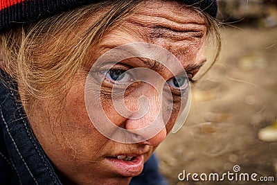 Close-up of a dirty, drunk, female face. P Stock Photo